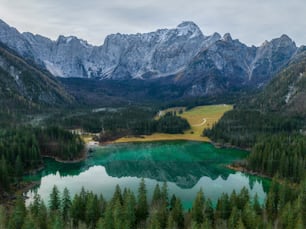 a large lake surrounded by mountains and trees