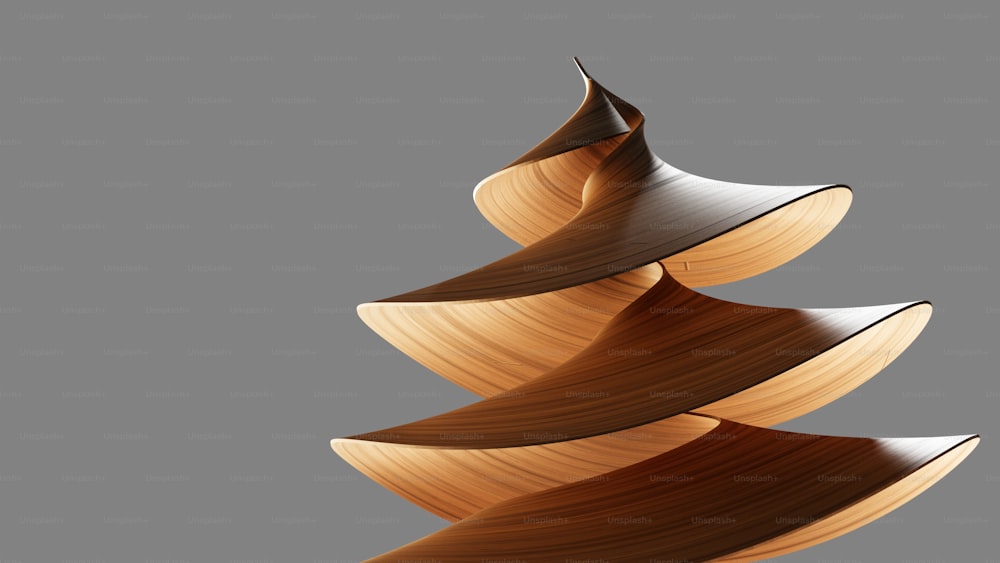 a wooden christmas tree is shown against a gray background