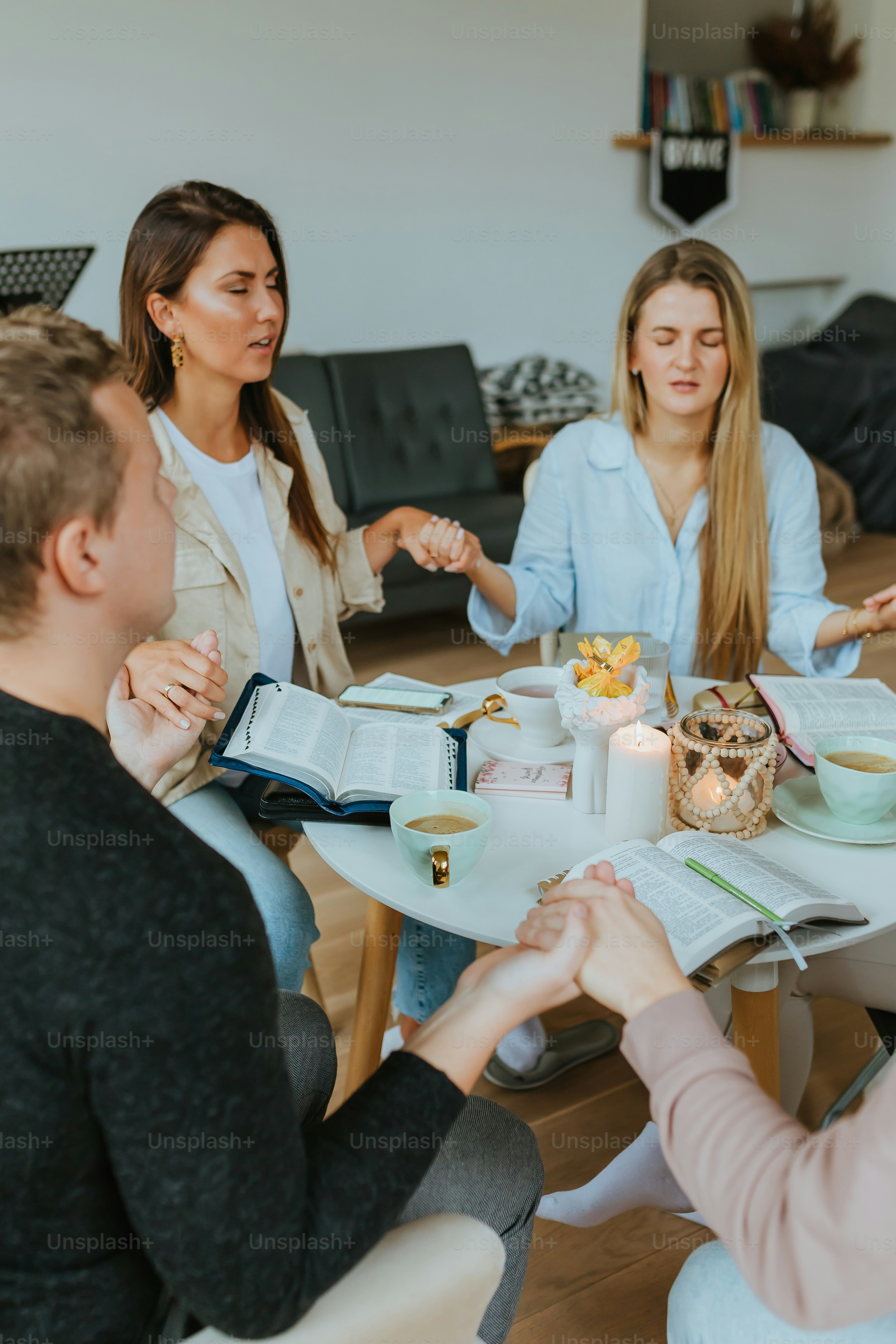 a group of people sitting around a table