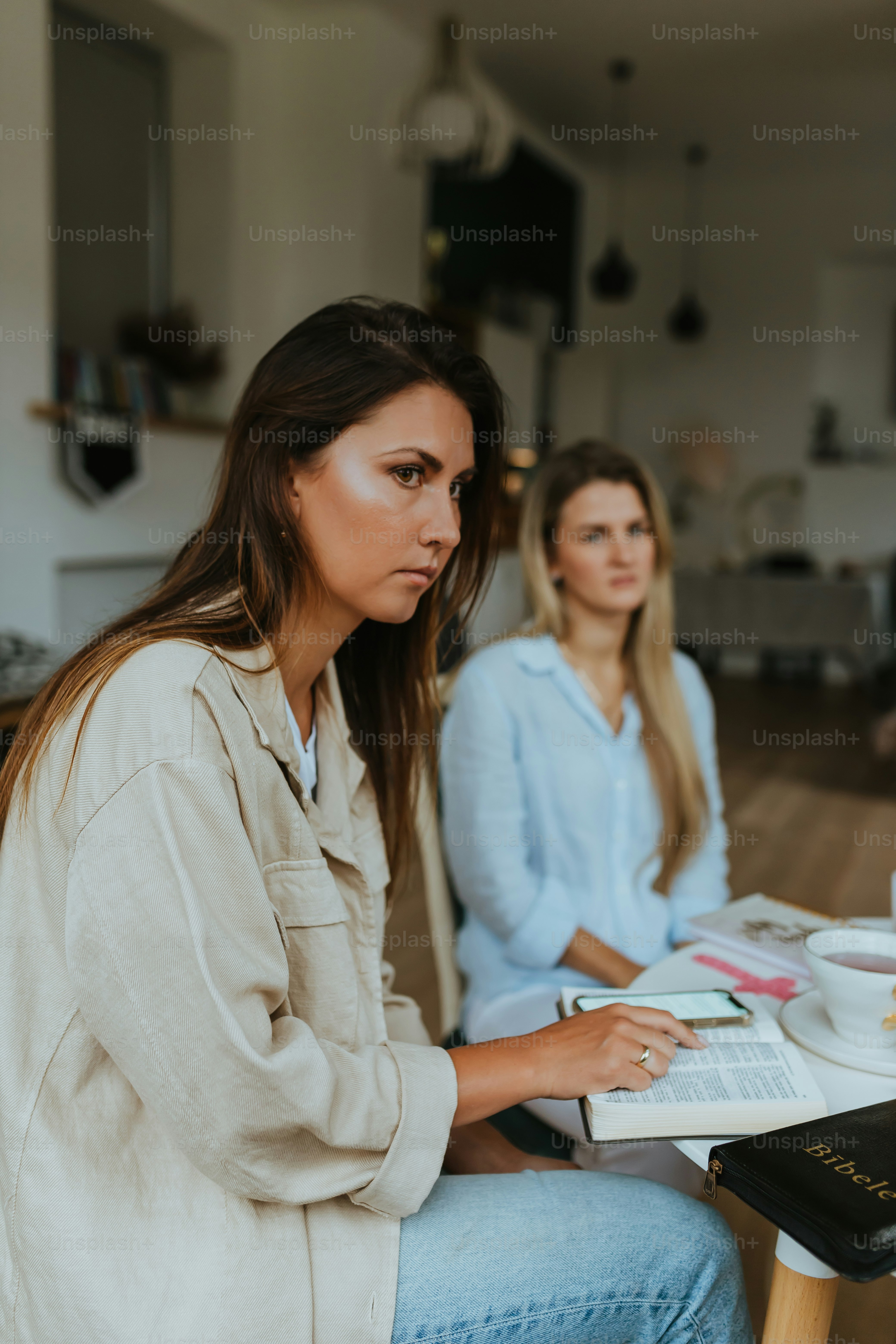 a woman sitting at a table