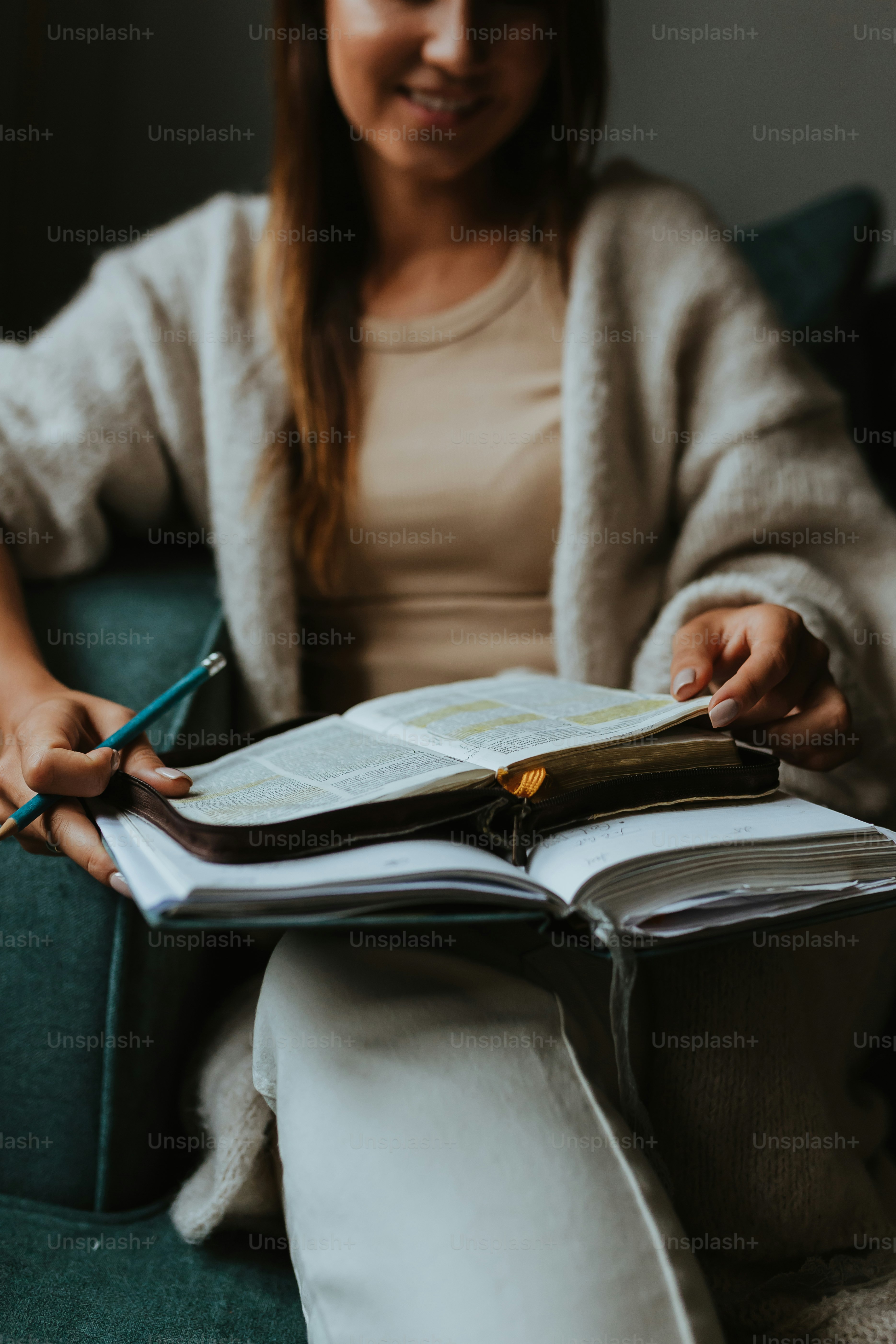 a person writing on a book