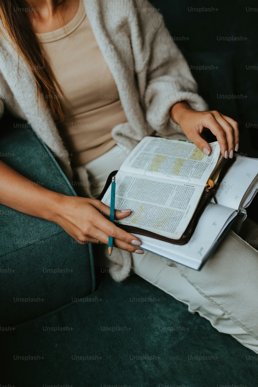 a person writing on a book