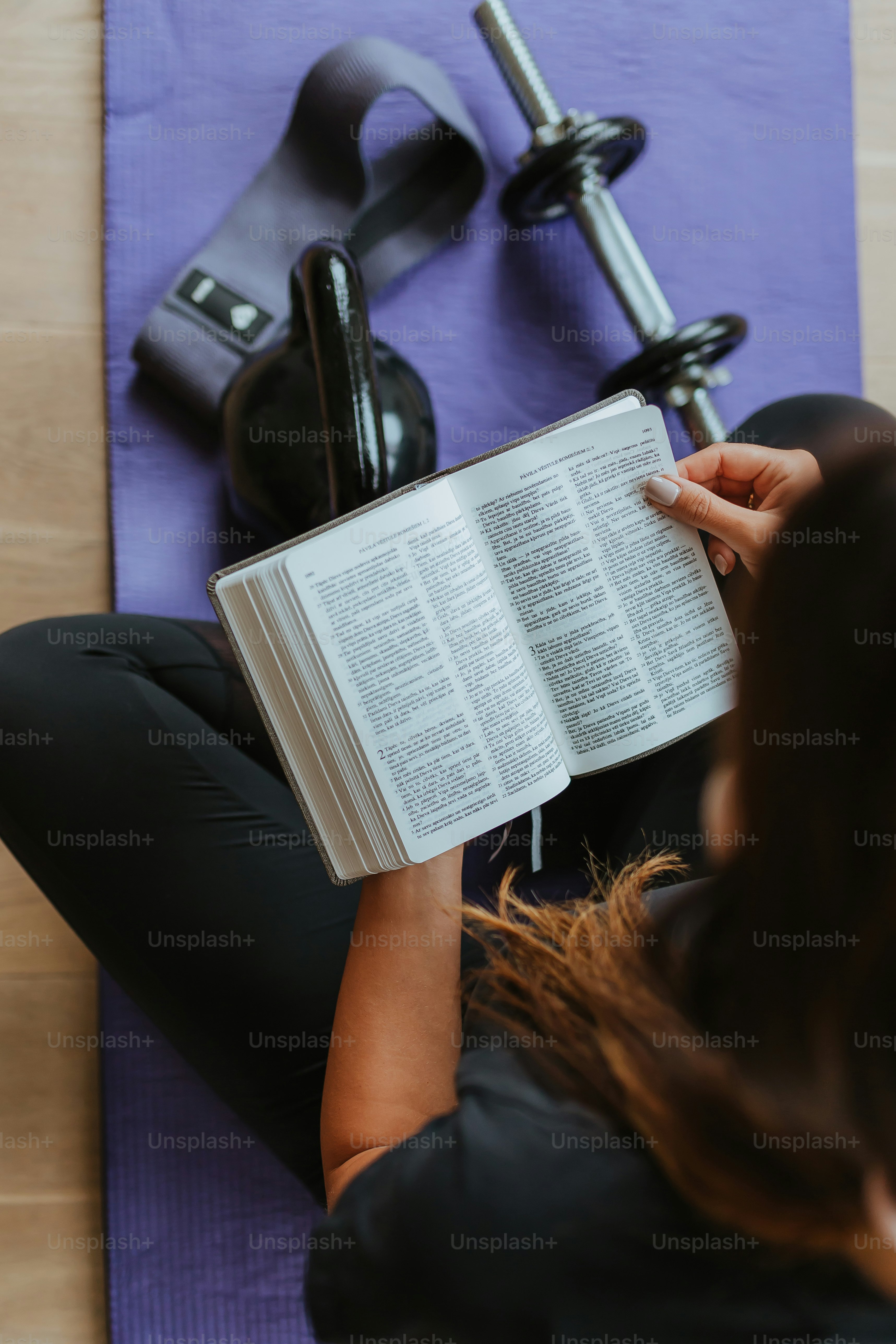 a person writing on a piece of paper