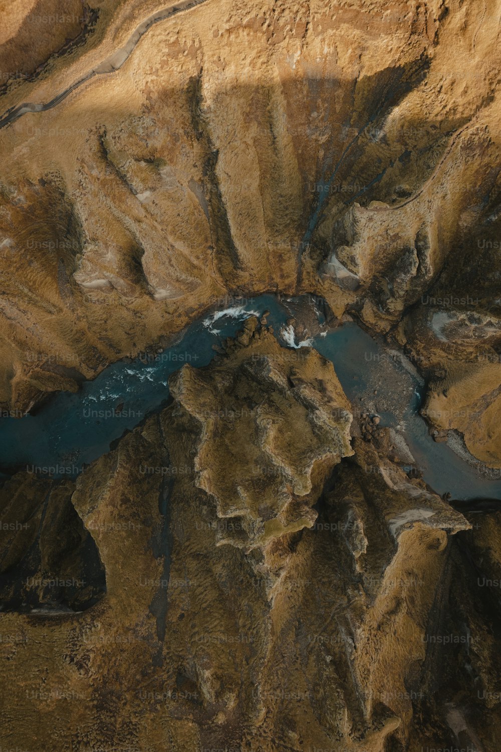 a bird's eye view of a river in a canyon