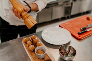 a person is preparing food in a kitchen