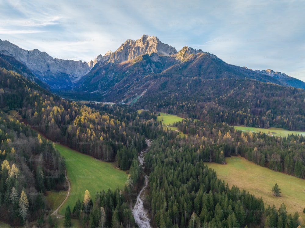 an aerial view of a mountain range with a river running through it