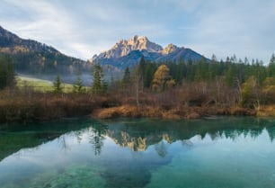 a river with a mountain in the background