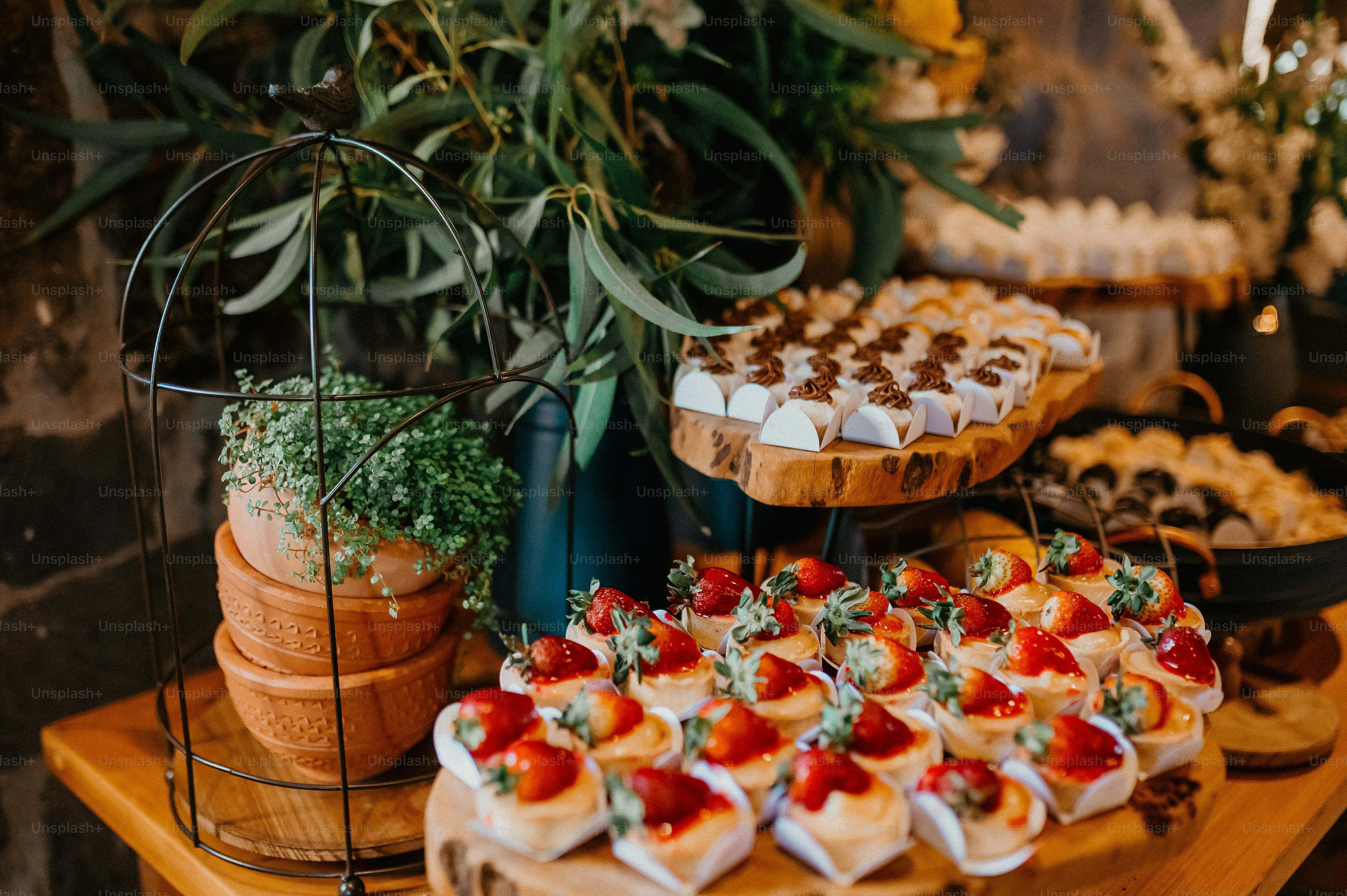 a variety of desserts are displayed on a table