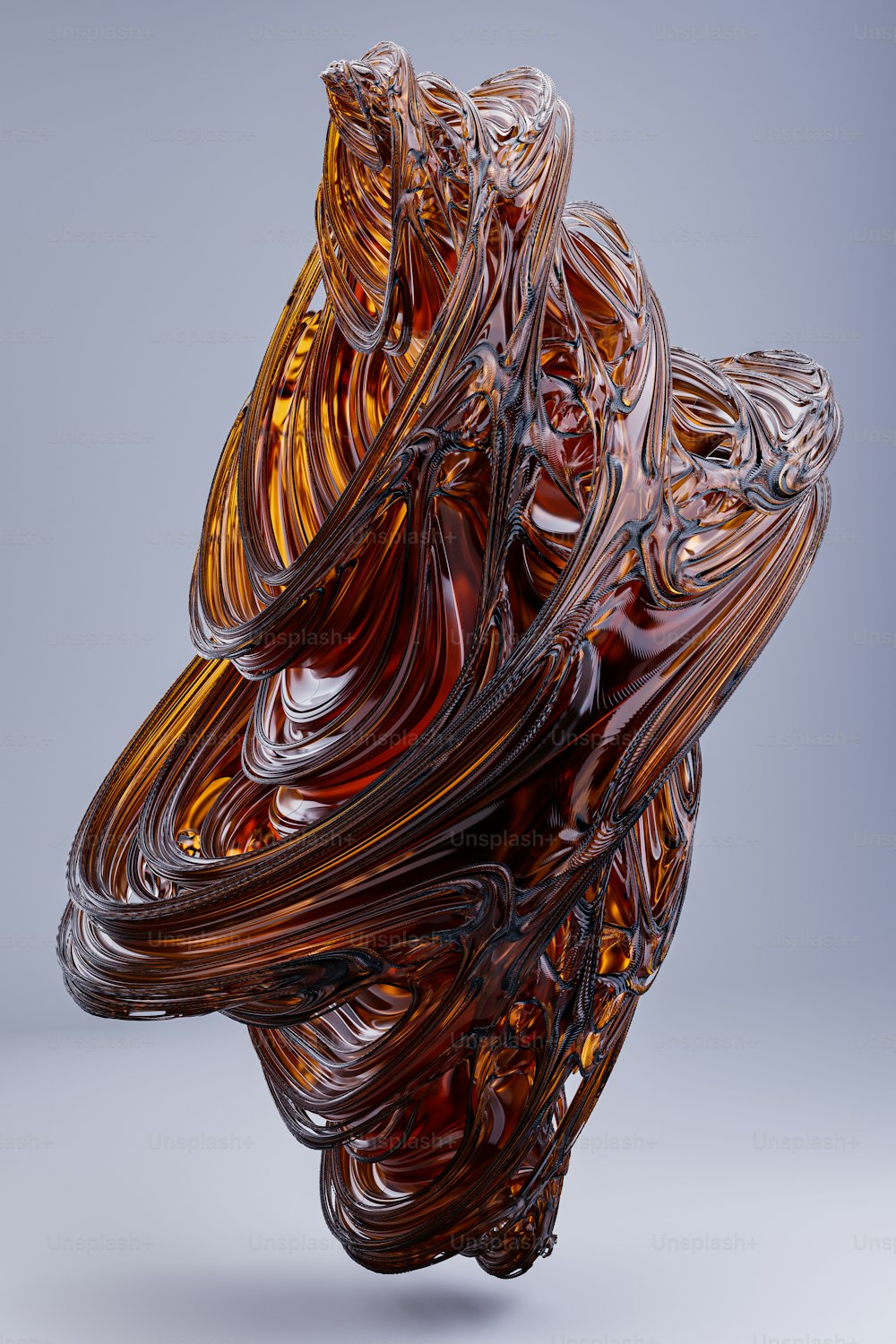 a glass sculpture is shown on a gray background