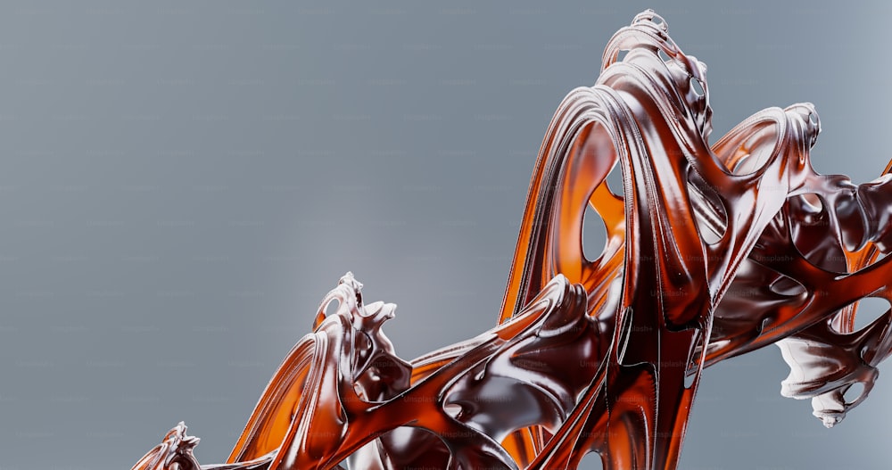 a close up of a glass sculpture on a gray background