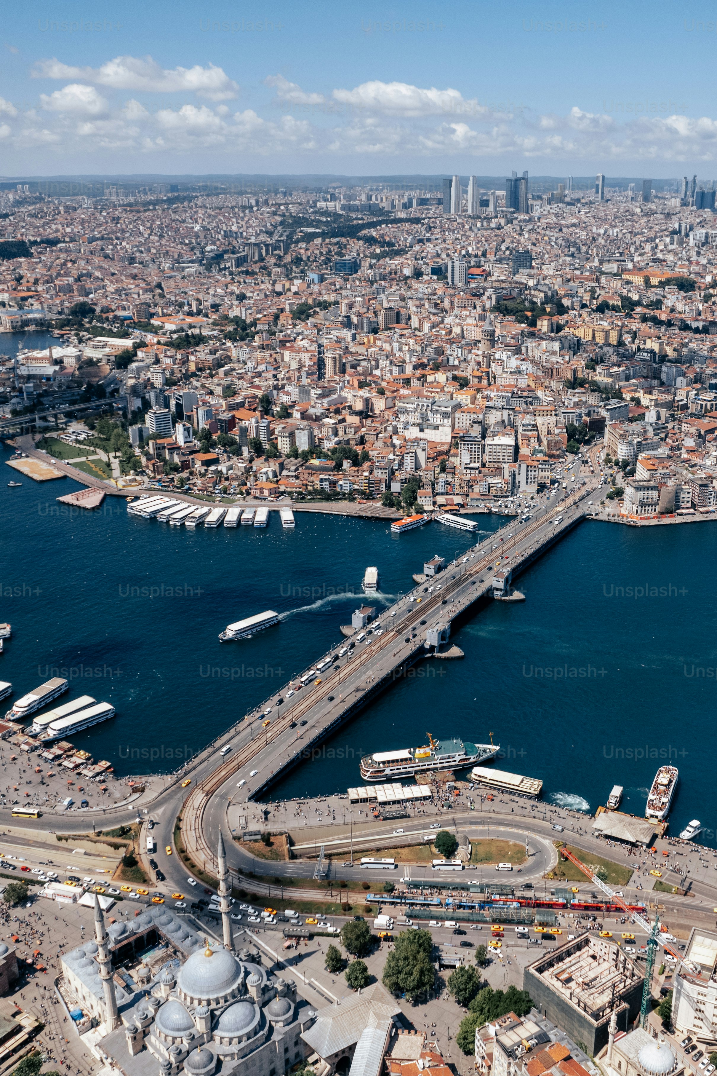 an aerial view of a city and a bridge