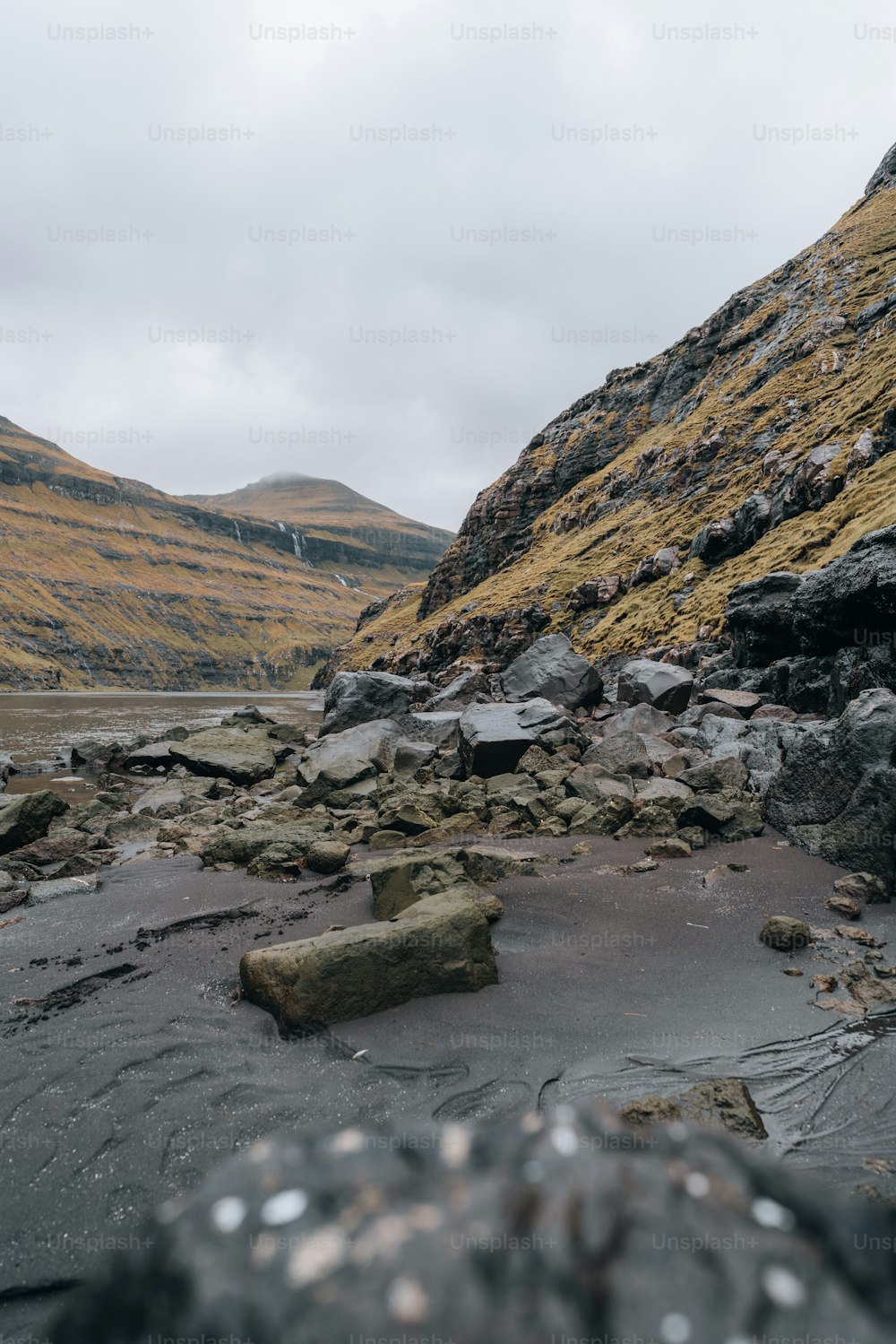 a rocky area with a river running through it