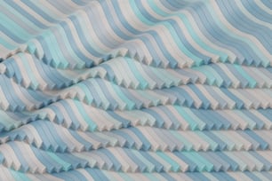 a close up of a blue and white striped fabric