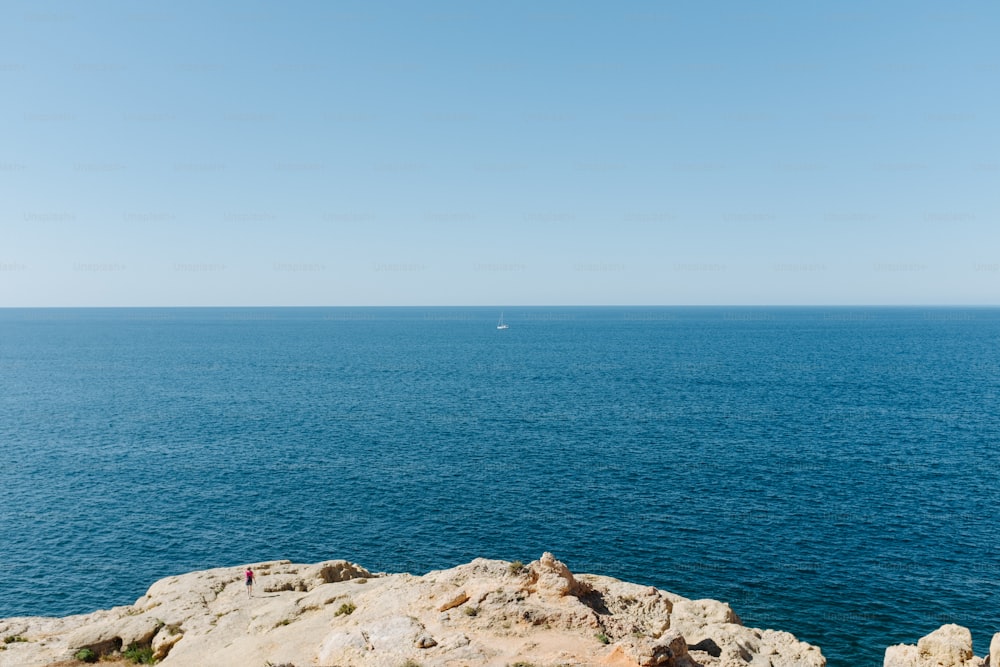 a view of a body of water from a cliff