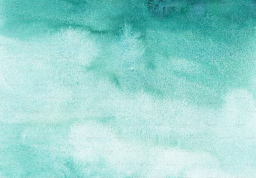 a blue and green watercolor background with white clouds