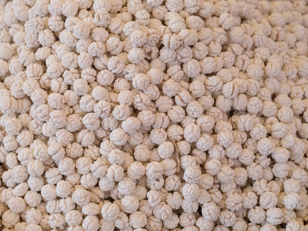 a close up of a bunch of white balls