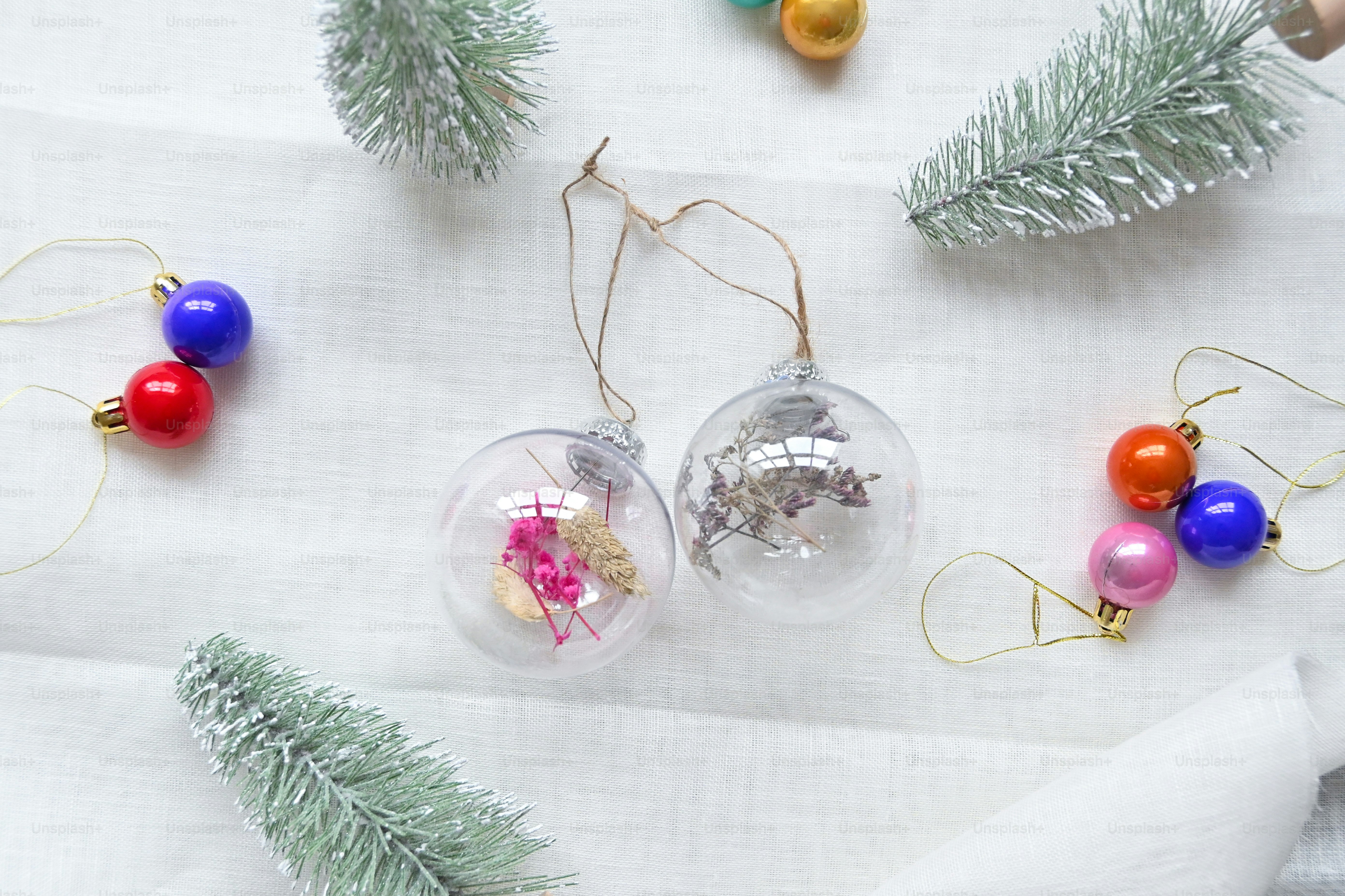 a white table topped with christmas ornaments