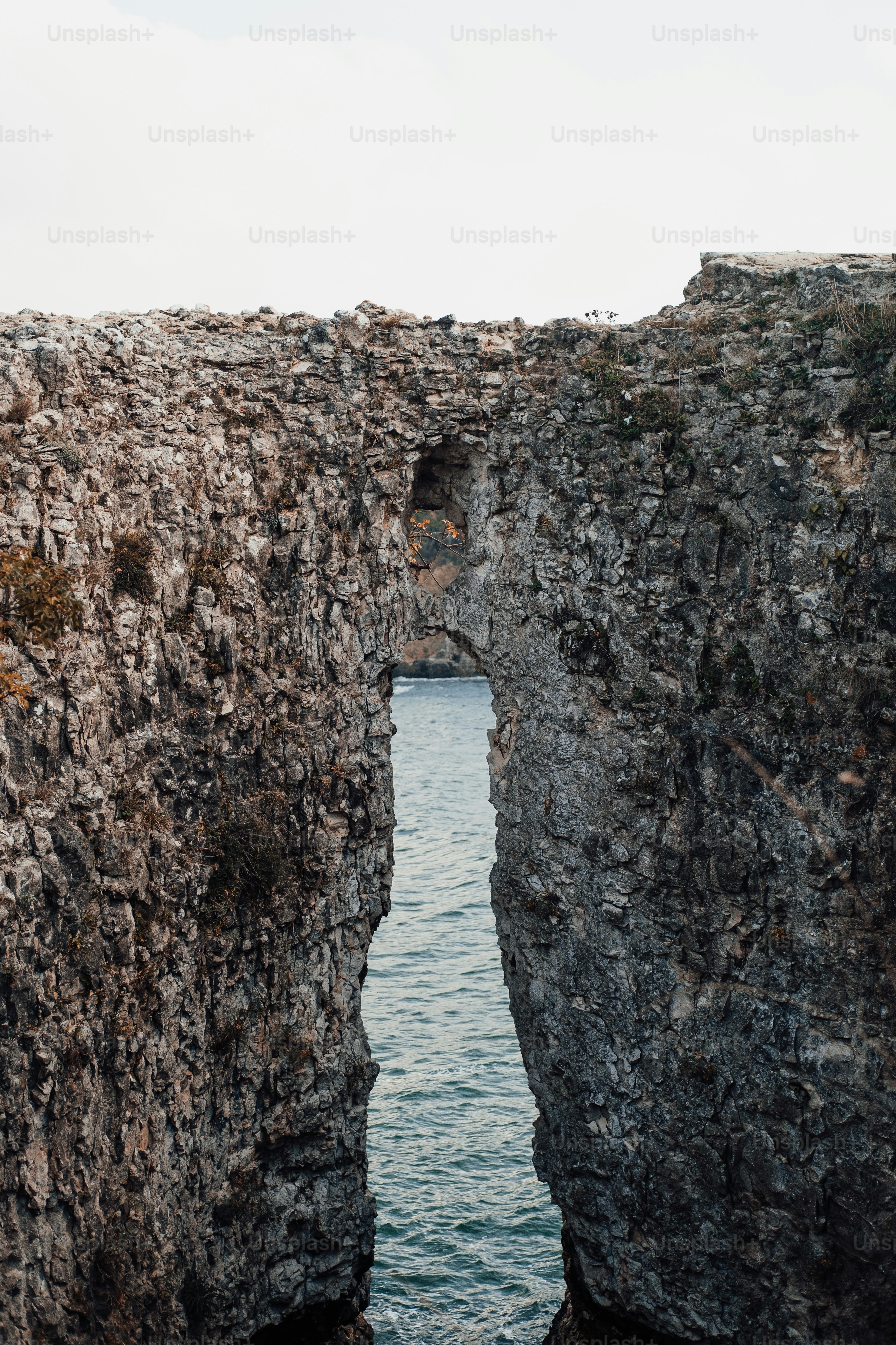 a large body of water surrounded by rocks