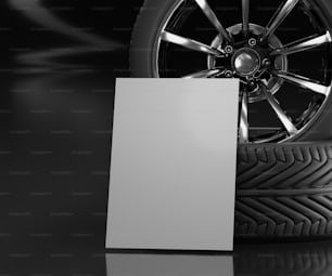 a car tire with a blank card next to it