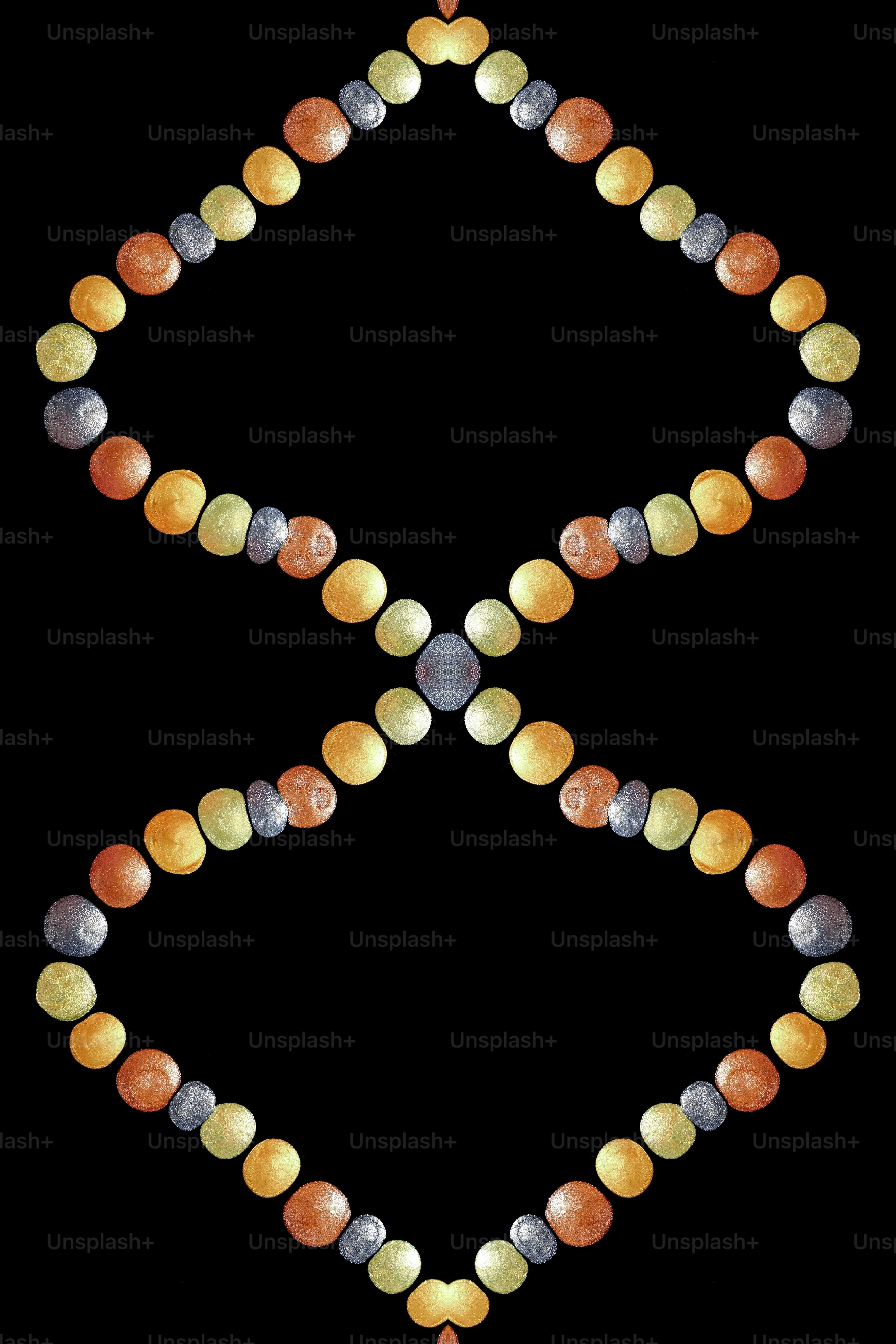 a picture of a cross made out of beads