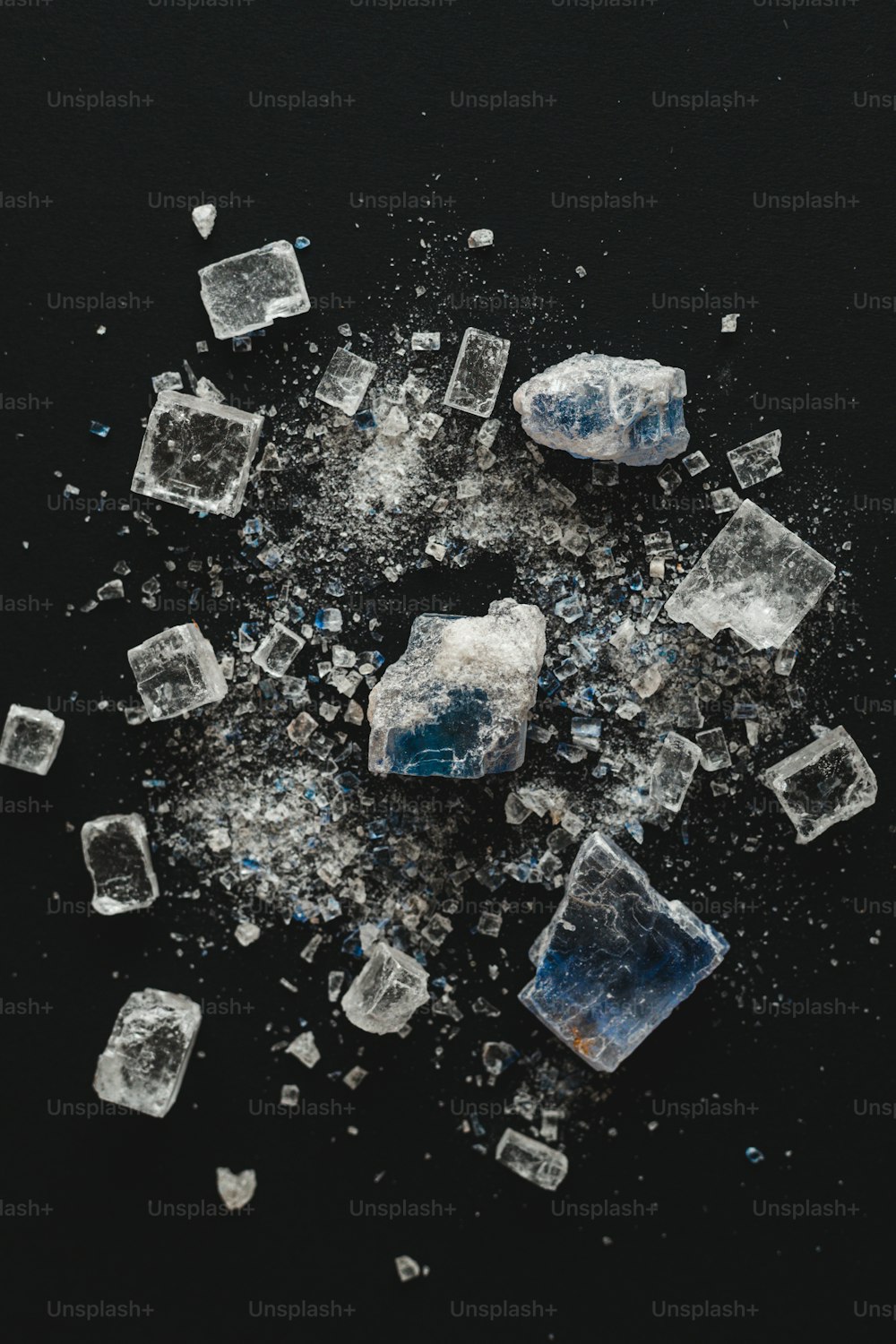 a pile of ice cubes sitting on top of a table