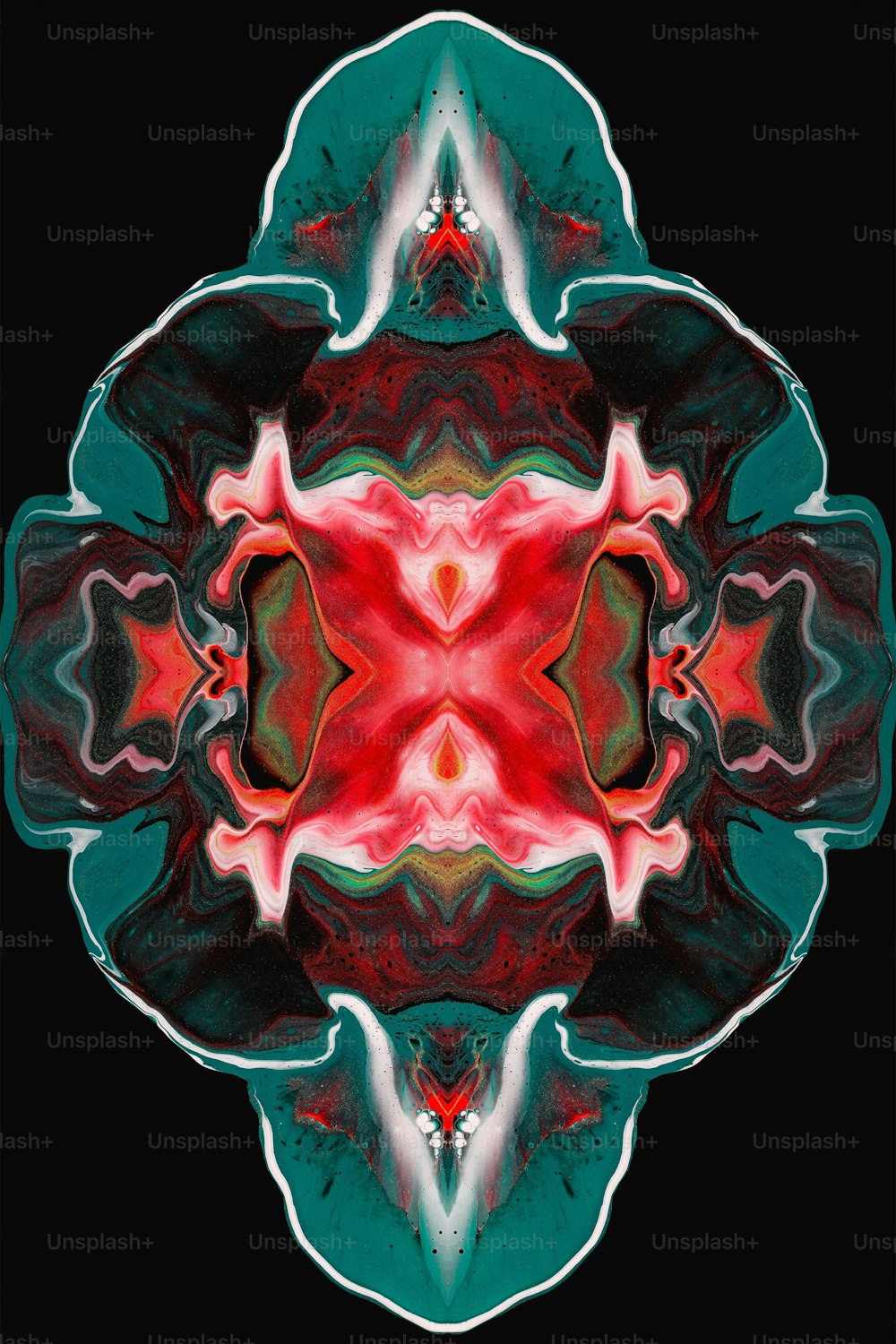 an abstract image of a red and green flower