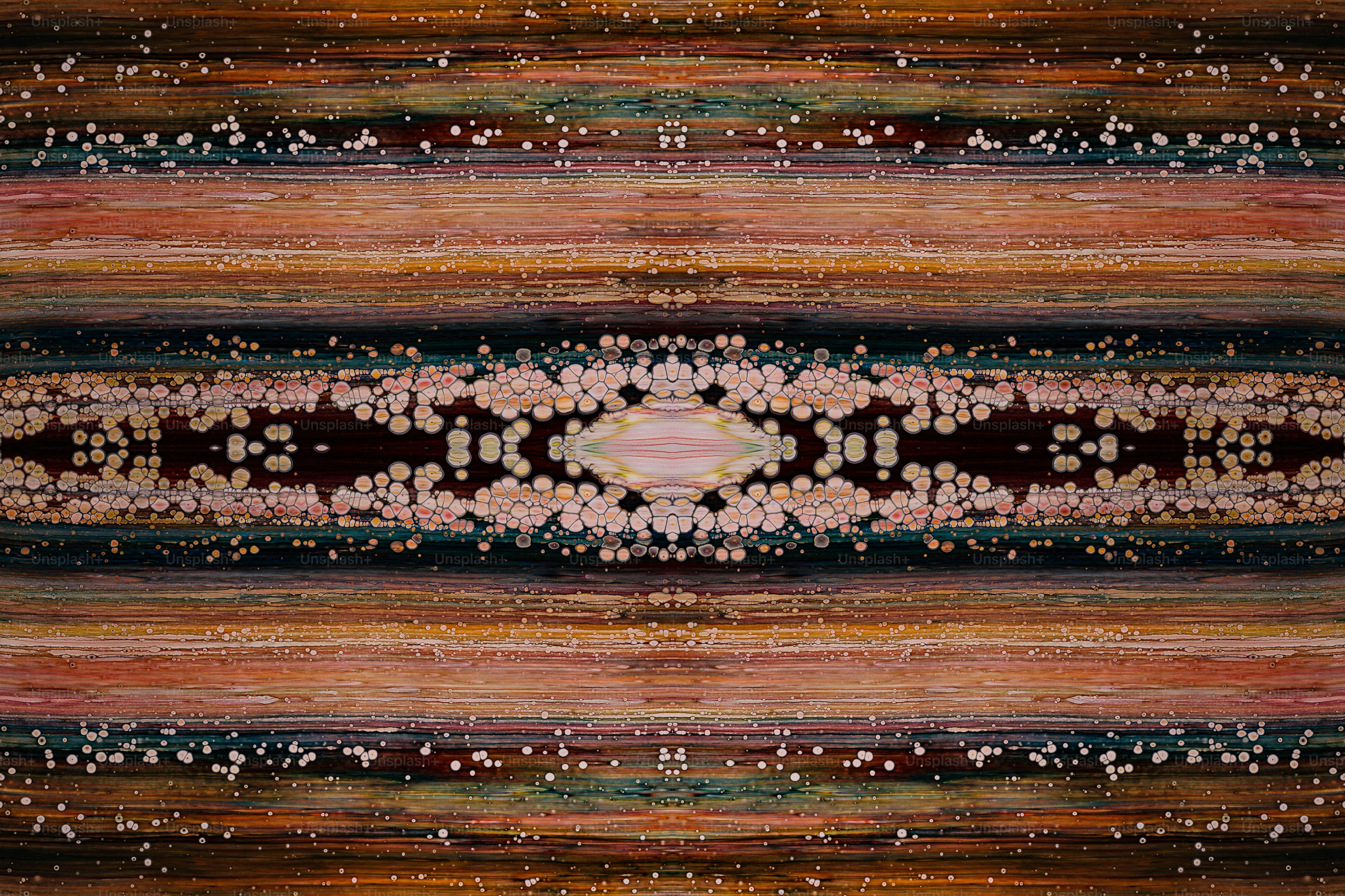 a multicolored striped pattern with a circular design