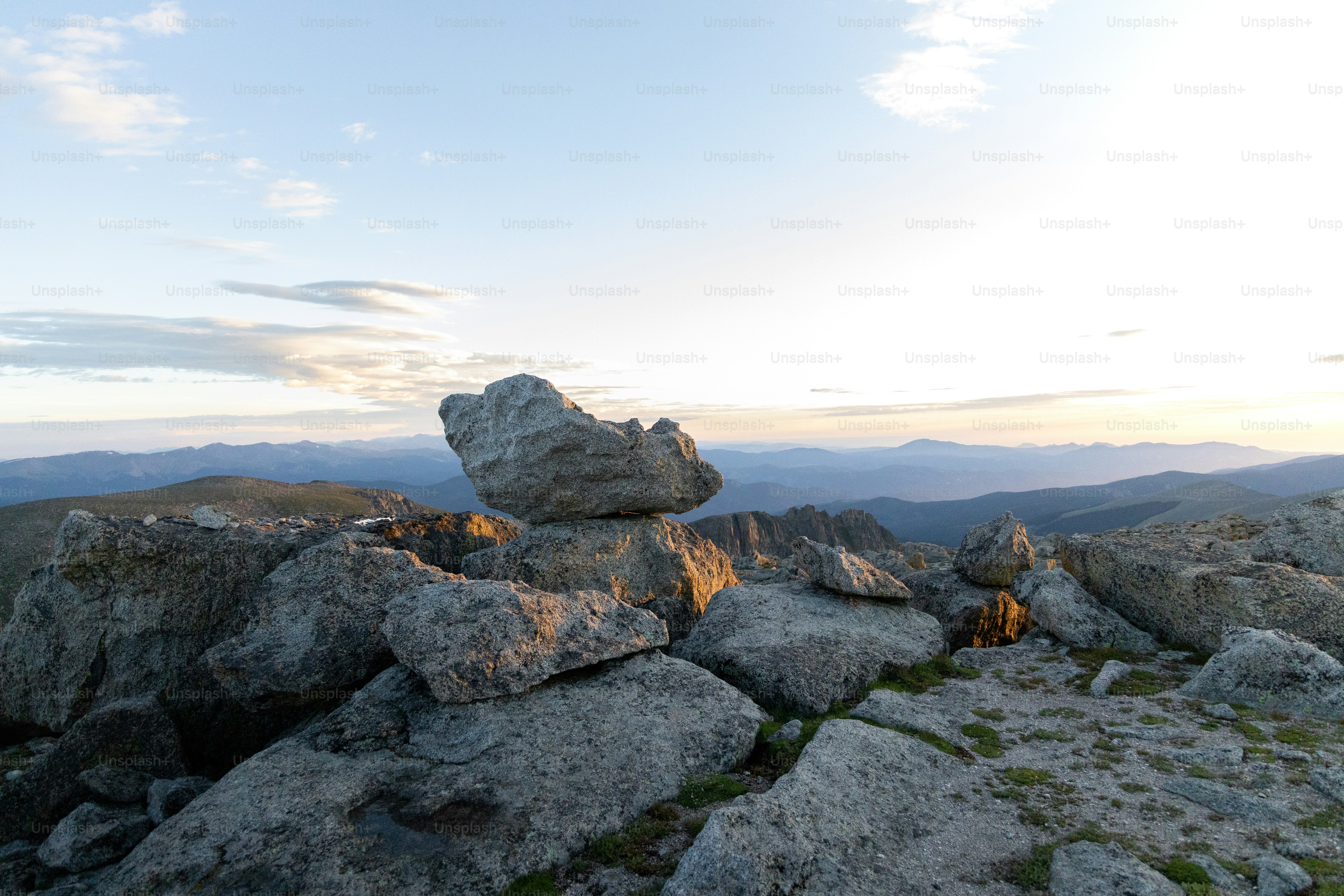 A large rock formation on top of a mountain photo – Level Image on Unsplash