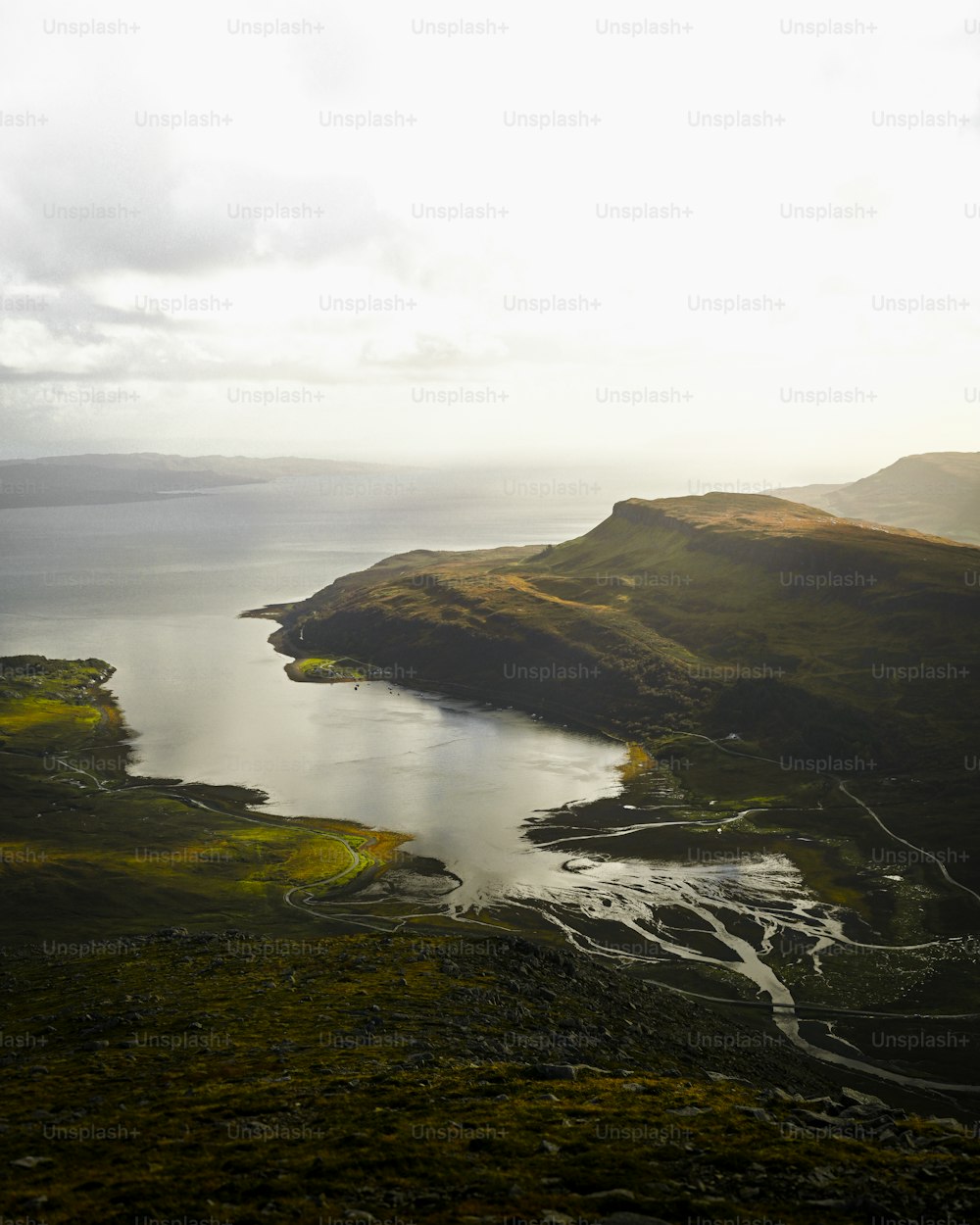 a large body of water surrounded by mountains