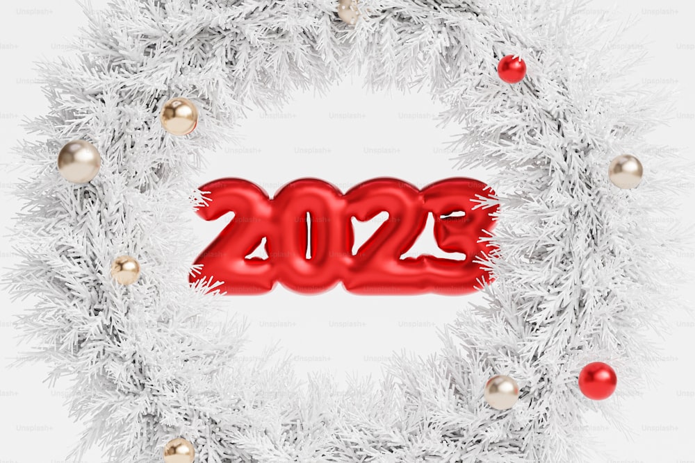 真ん中に赤い新年の番号が付いた白い花輪