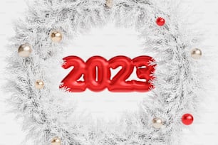 une couronne blanche avec un numéro rouge du Nouvel An au milieu