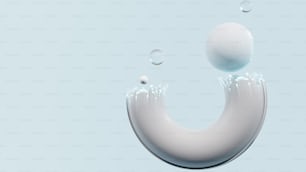 um objeto branco flutuando no ar com bolhas