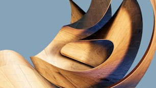 a sculpture made of wood with a blue sky in the background