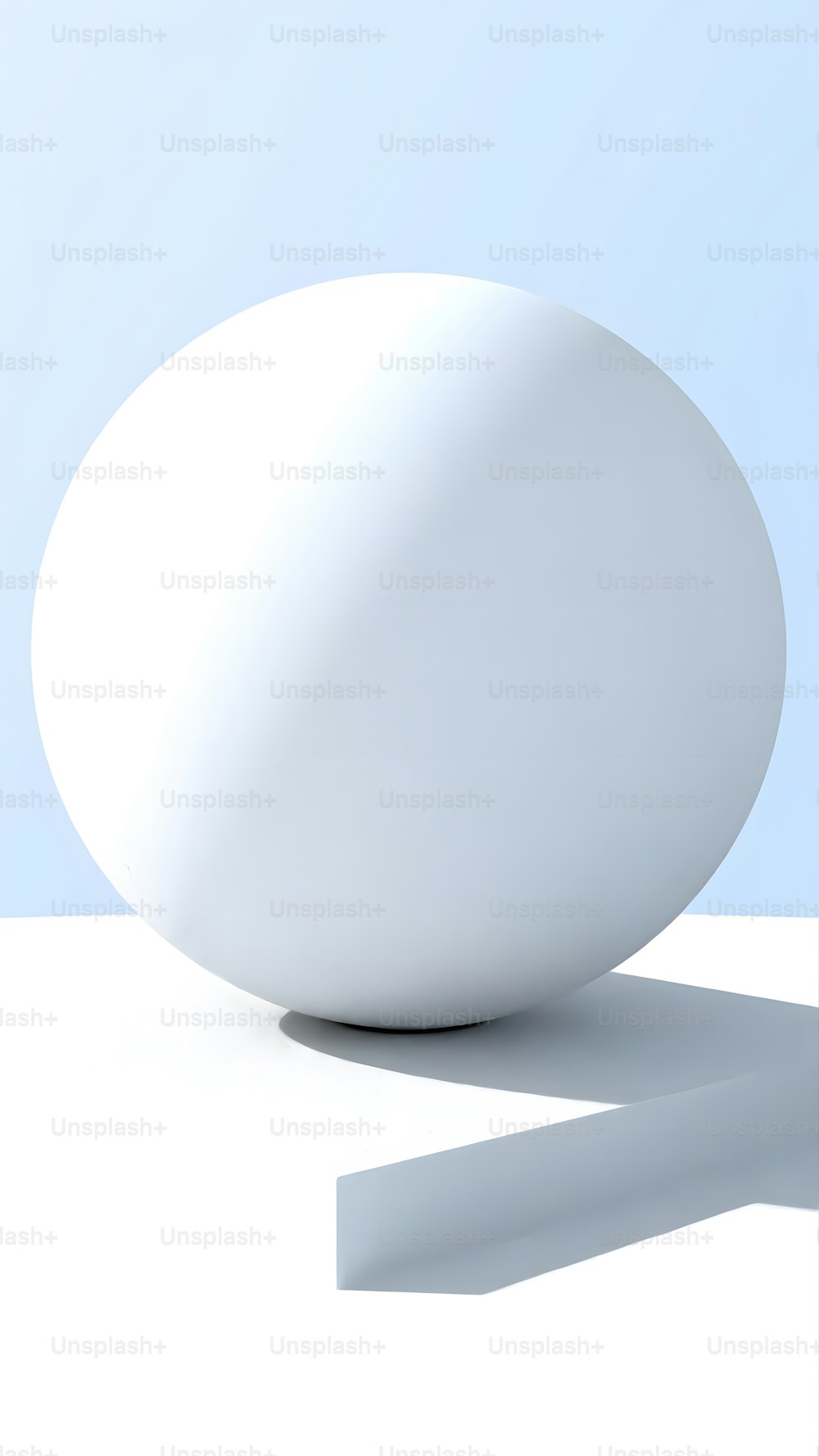 a white sphere sitting on top of a table