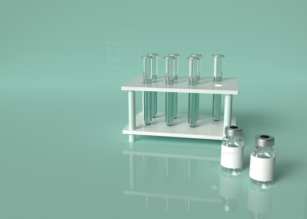 una serie di attrezzature da laboratorio sedute sopra un tavolo