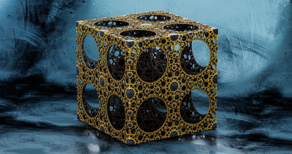 a cube shaped object with holes cut out of it