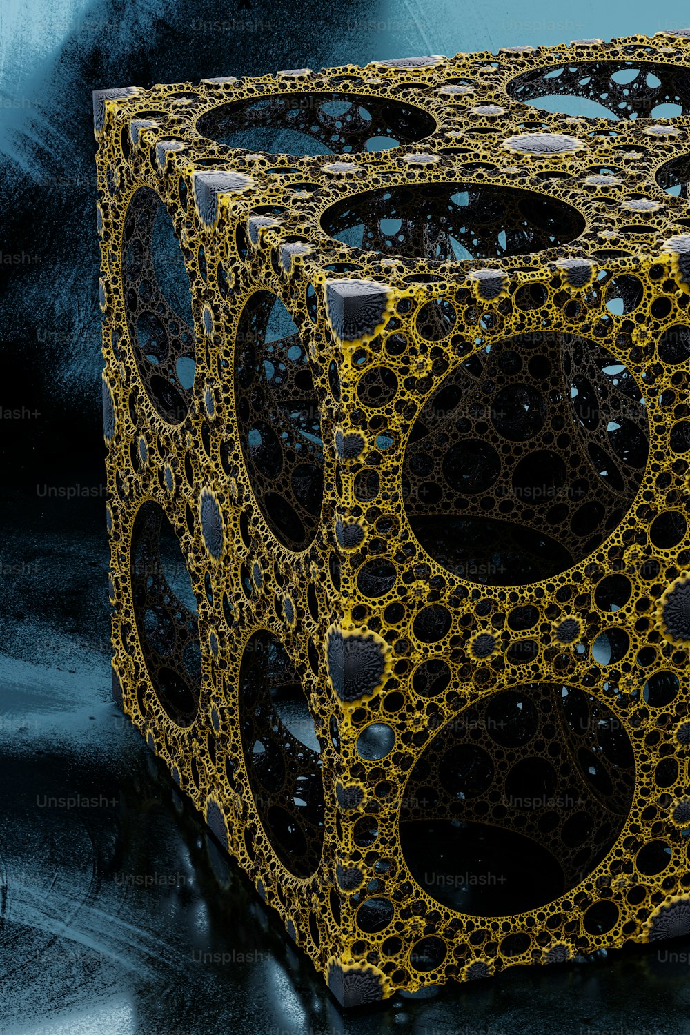 a cube made out of black and yellow circles