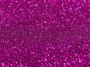 a bright pink glitter background with lots of sparkle