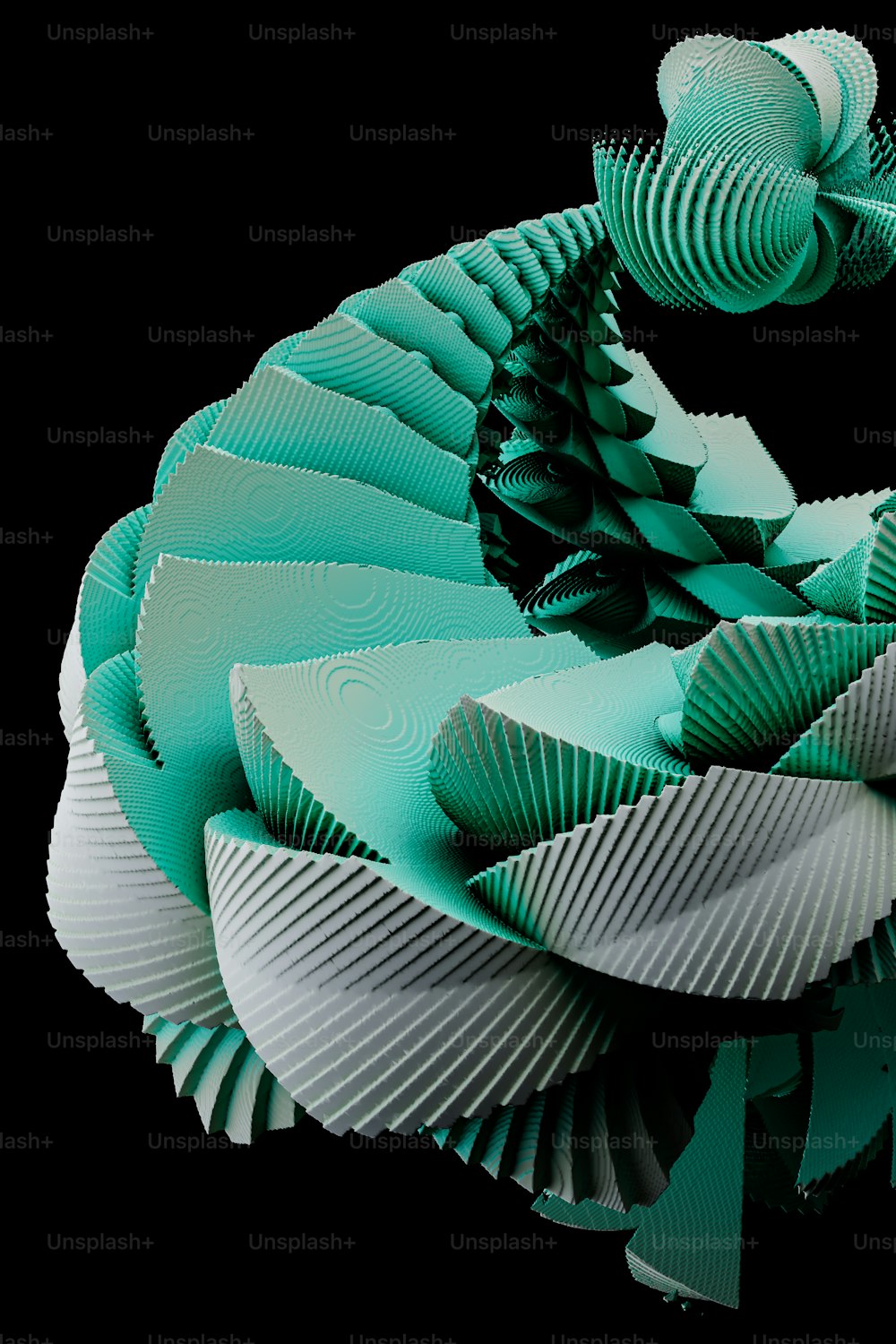 a green and white paper sculpture on a black background