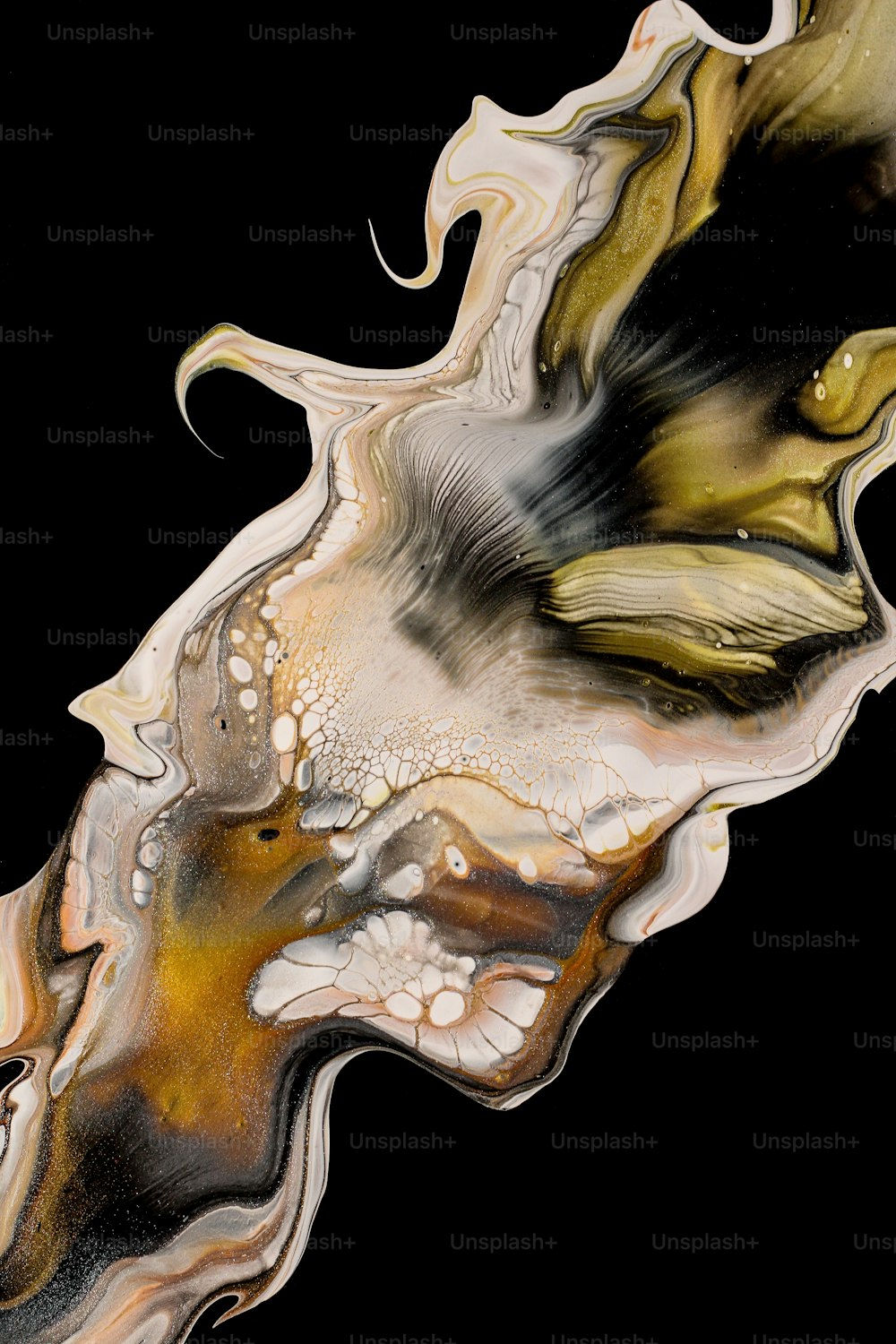 a black background with a yellow and white swirl