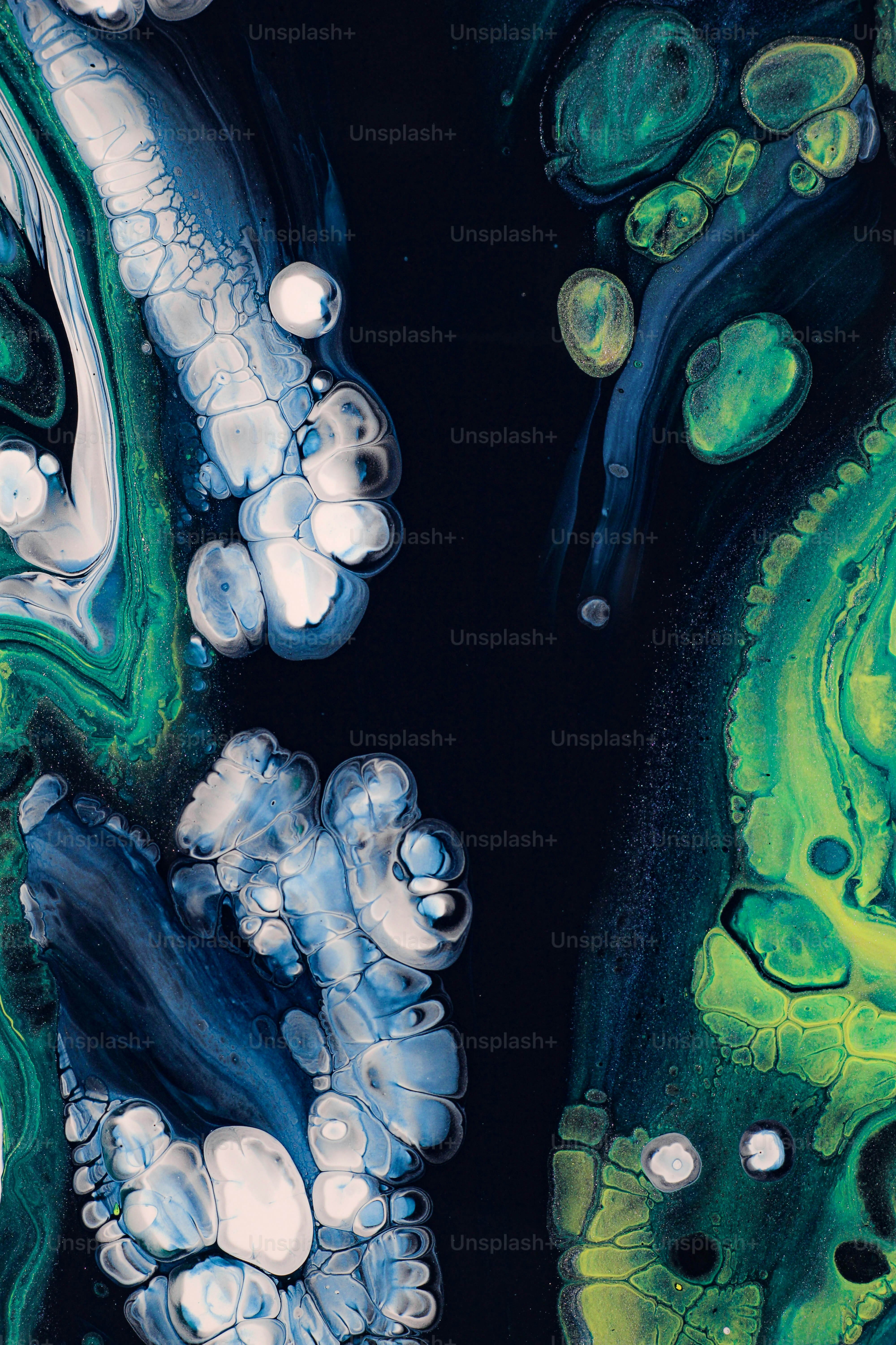 a close up picture of a green and blue substance