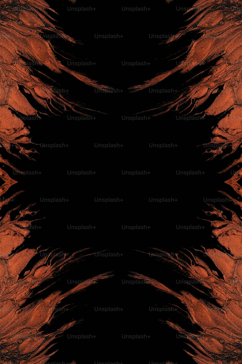 an orange and black background with a black center