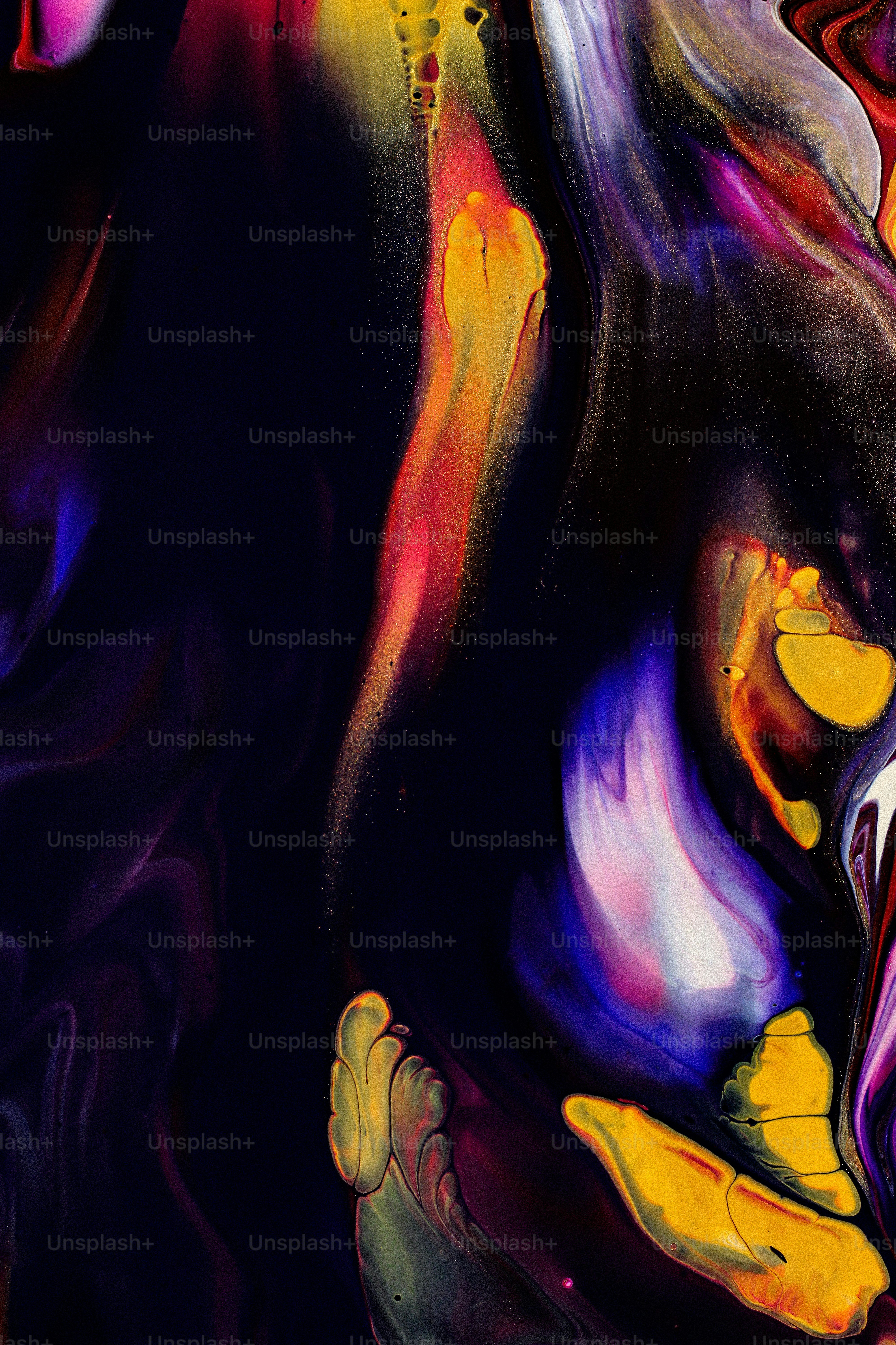 a painting of a woman's face with yellow, purple, and red colors