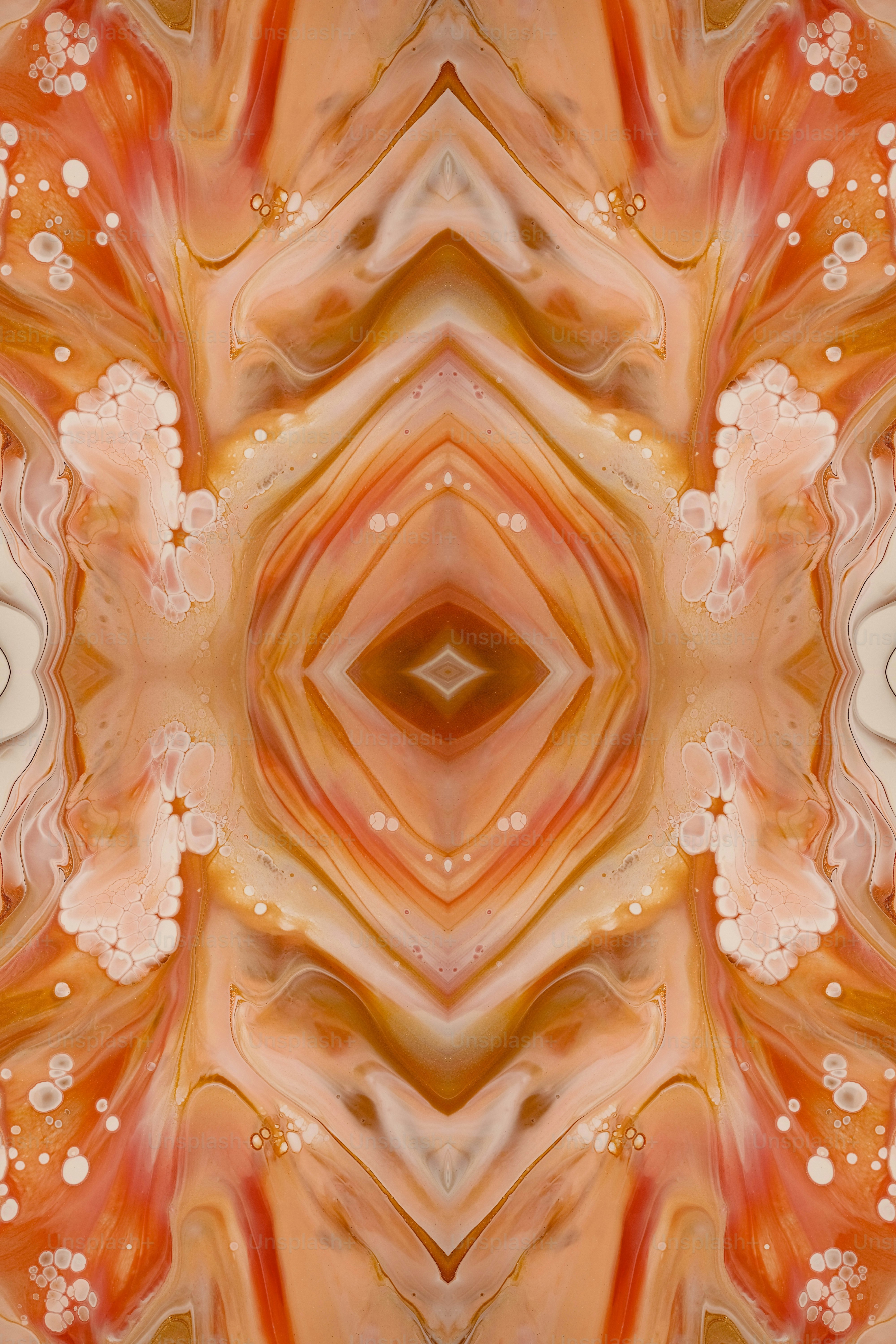 uma imagem abstrata de uma flor laranja e branca