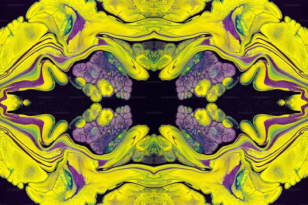 an abstract image of a yellow and purple flower