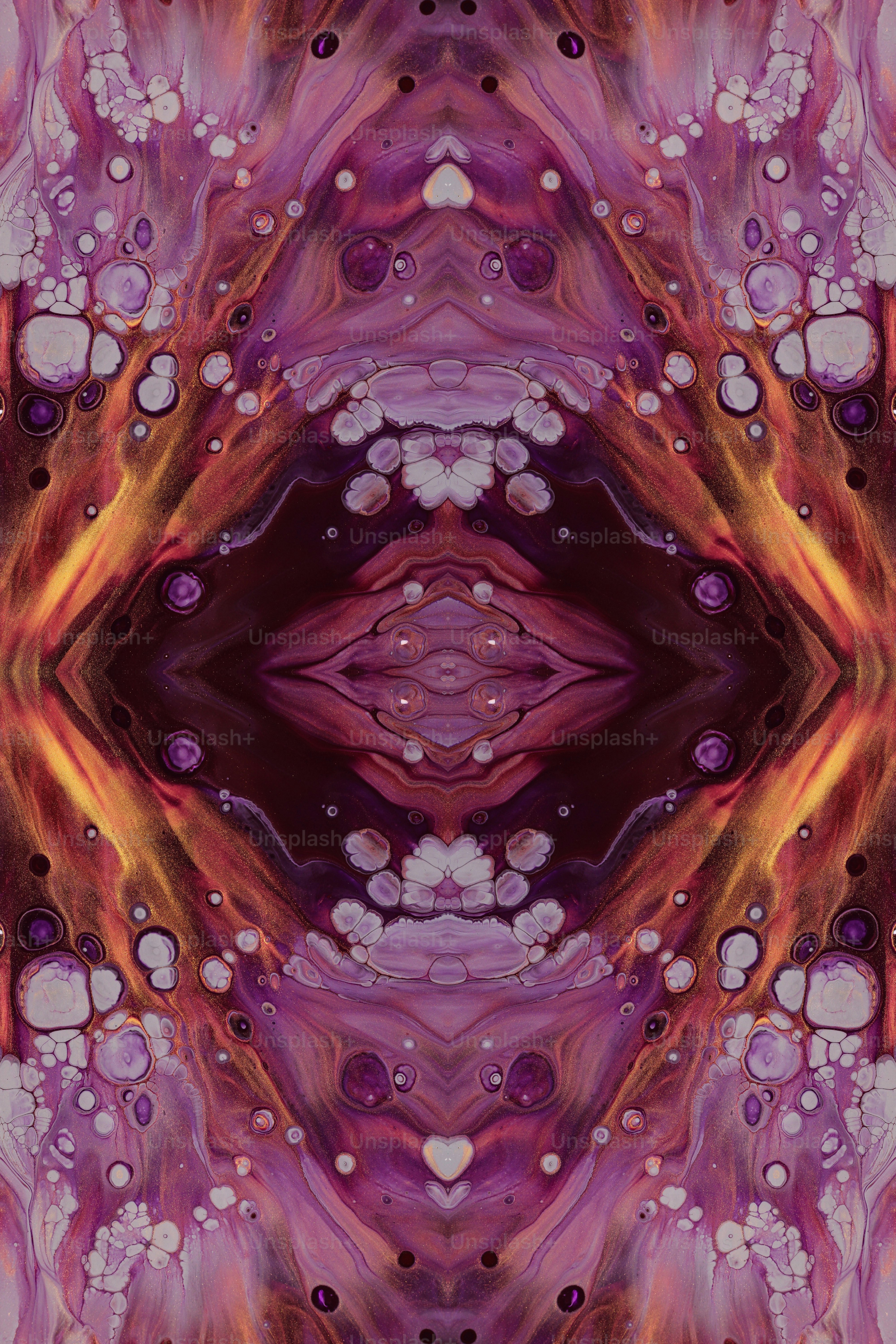 an abstract image of a purple and orange flower