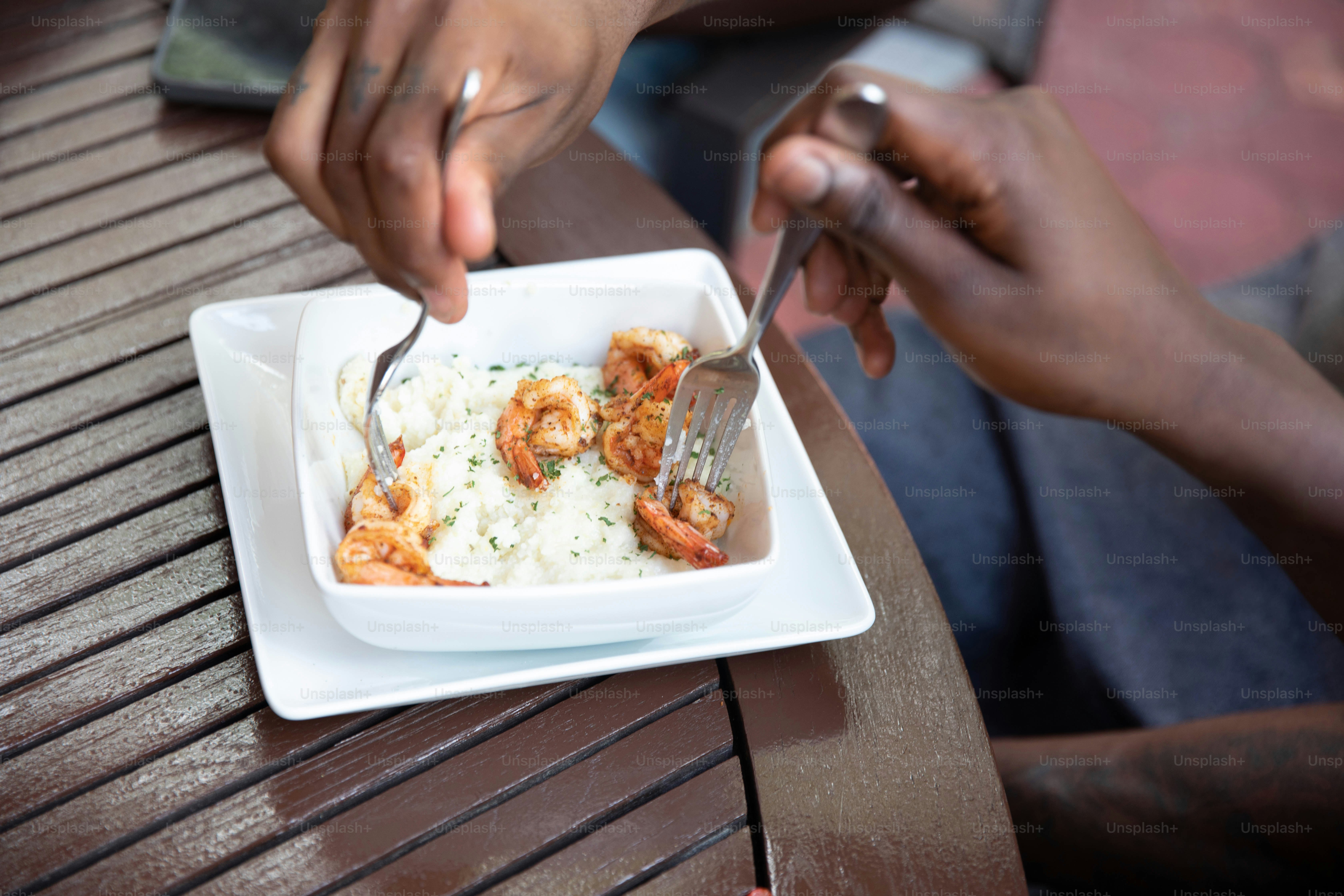 a plate of food with shrimp and rice
