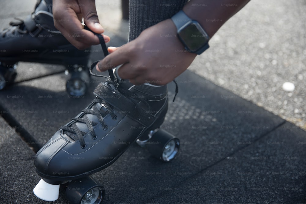 a close up of a person riding a skateboard