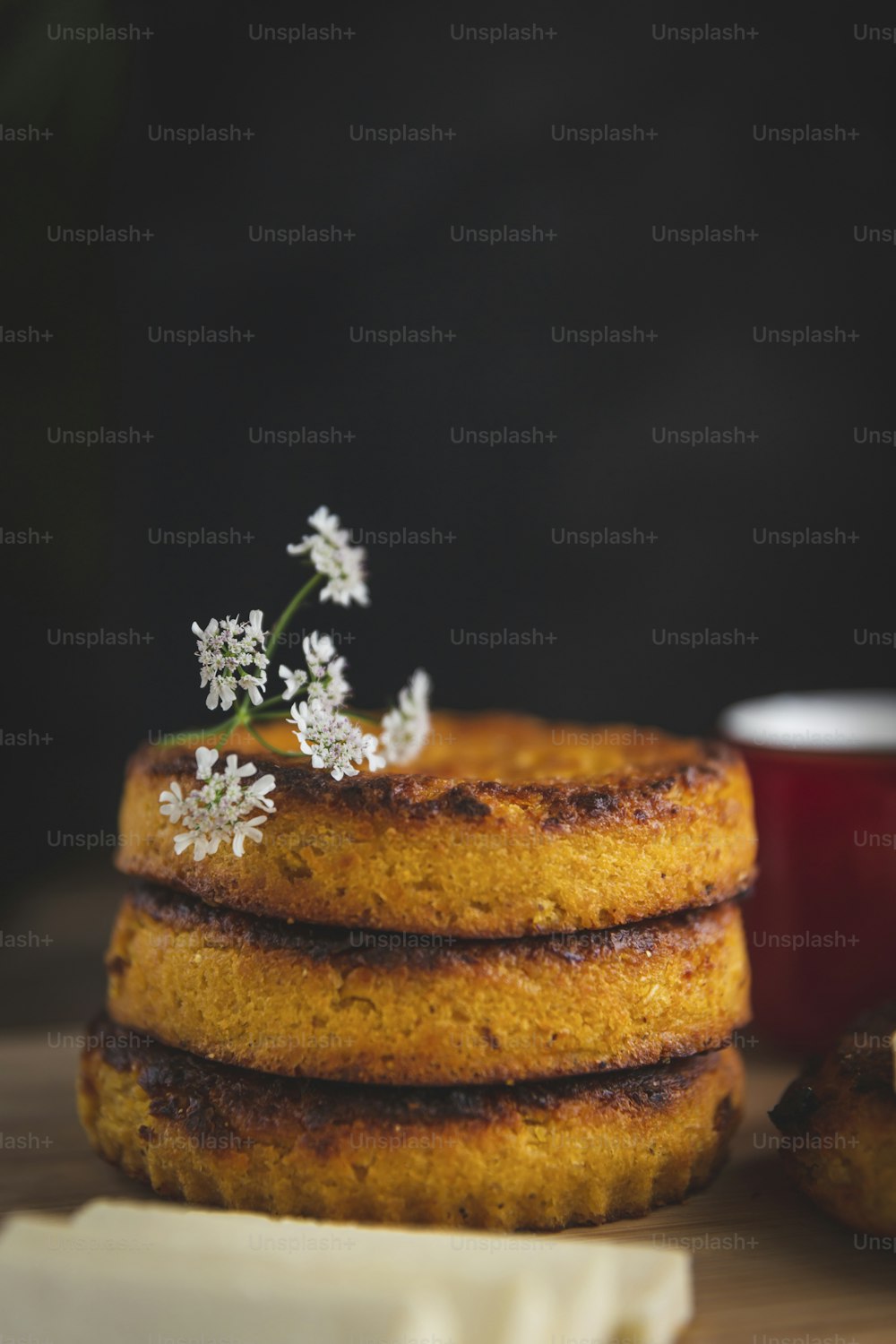 a stack of food sitting on top of a wooden table
