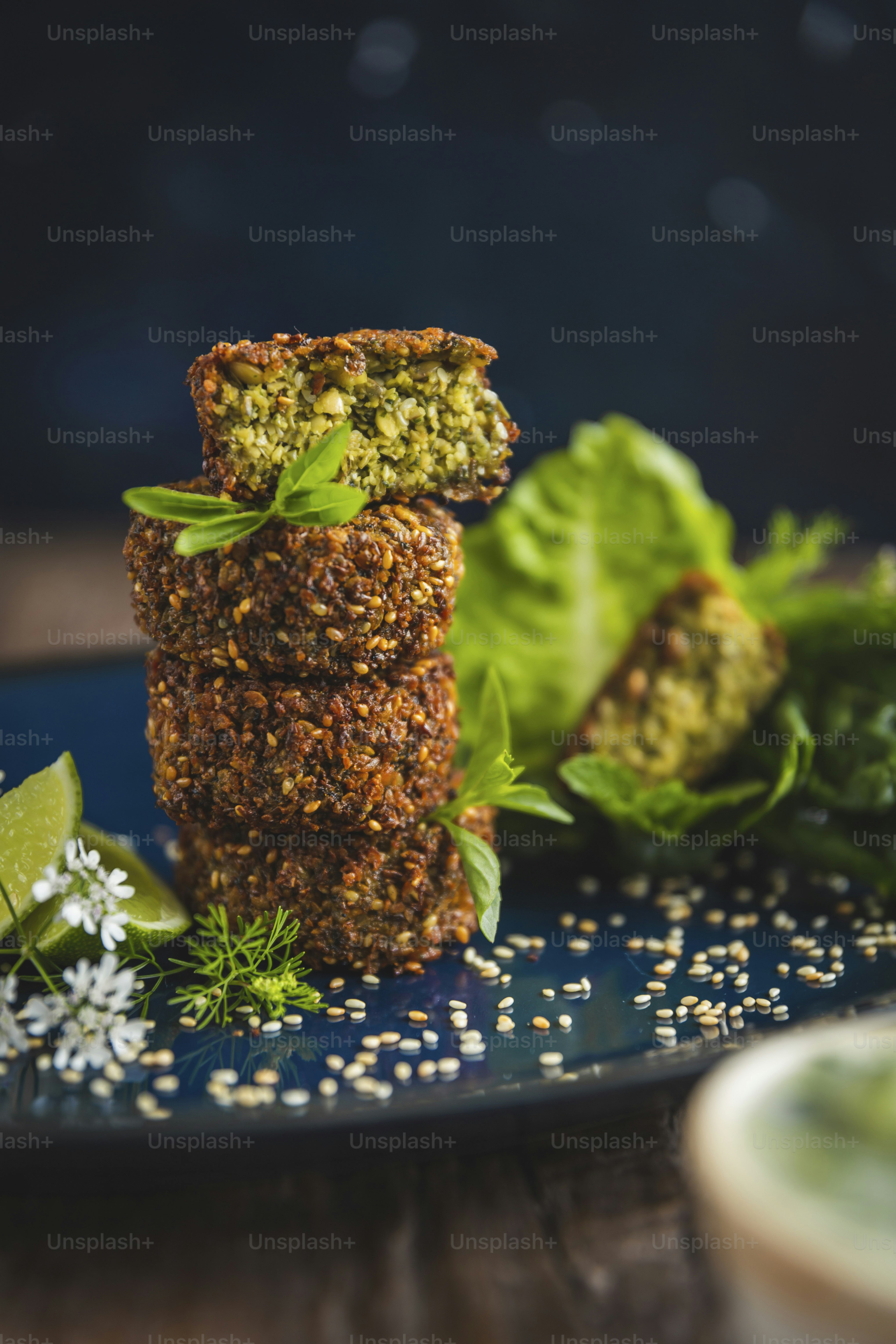a close up of a plate of food with lettuce